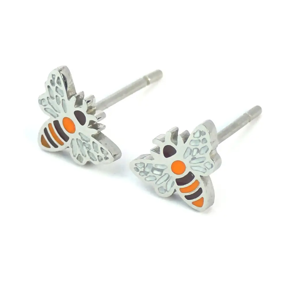 Silver-trimmed stud earrings shaped like a small white and orange striped bumblebee.