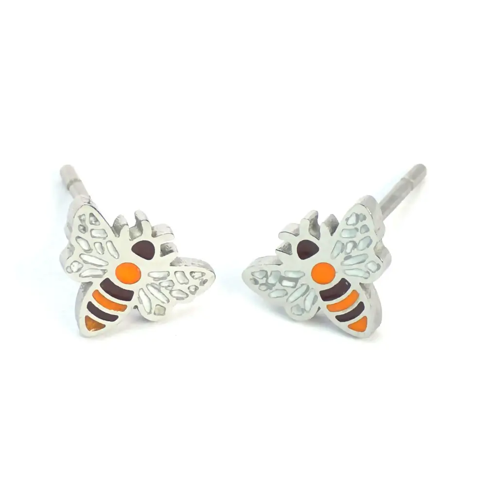 Silver-trimmed stud earrings shaped like a small white and orange striped bumblebee.