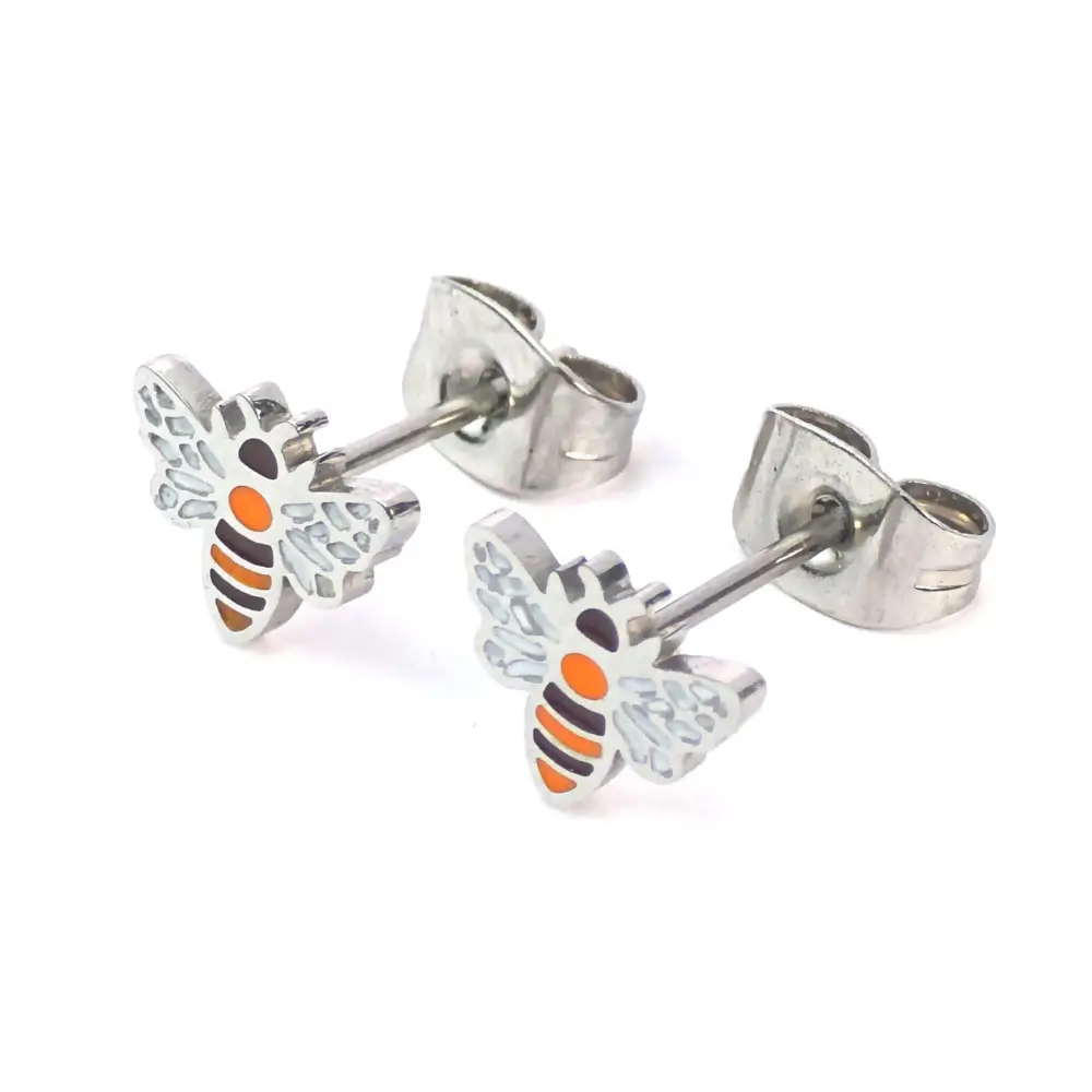 Silver-trimmed stud earrings shaped like a white and orange striped bumblebee, shown with the earring backs attached.