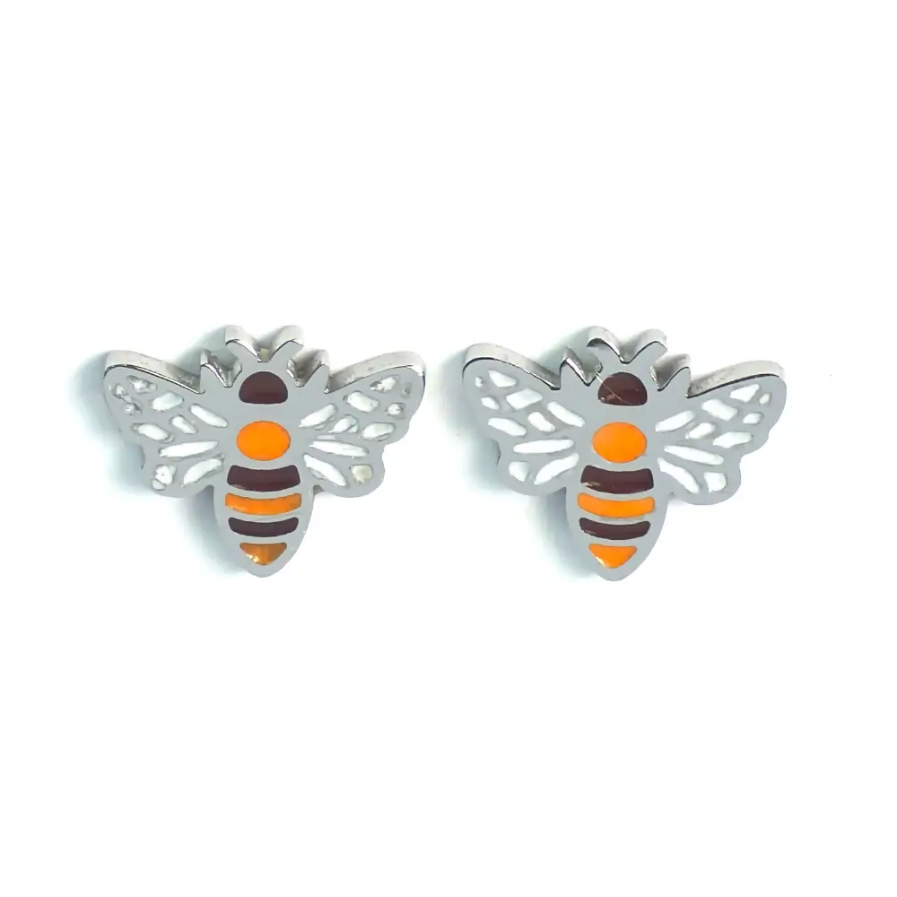 Silver-trimmed stud earrings shaped like a small white and orange striped bumblebee,