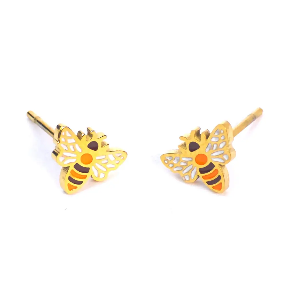 Cute bee stud earrings by Michelle Stephen, featuring gold-plated posts with yellow, orange, and white enamel wings and striped bodies.