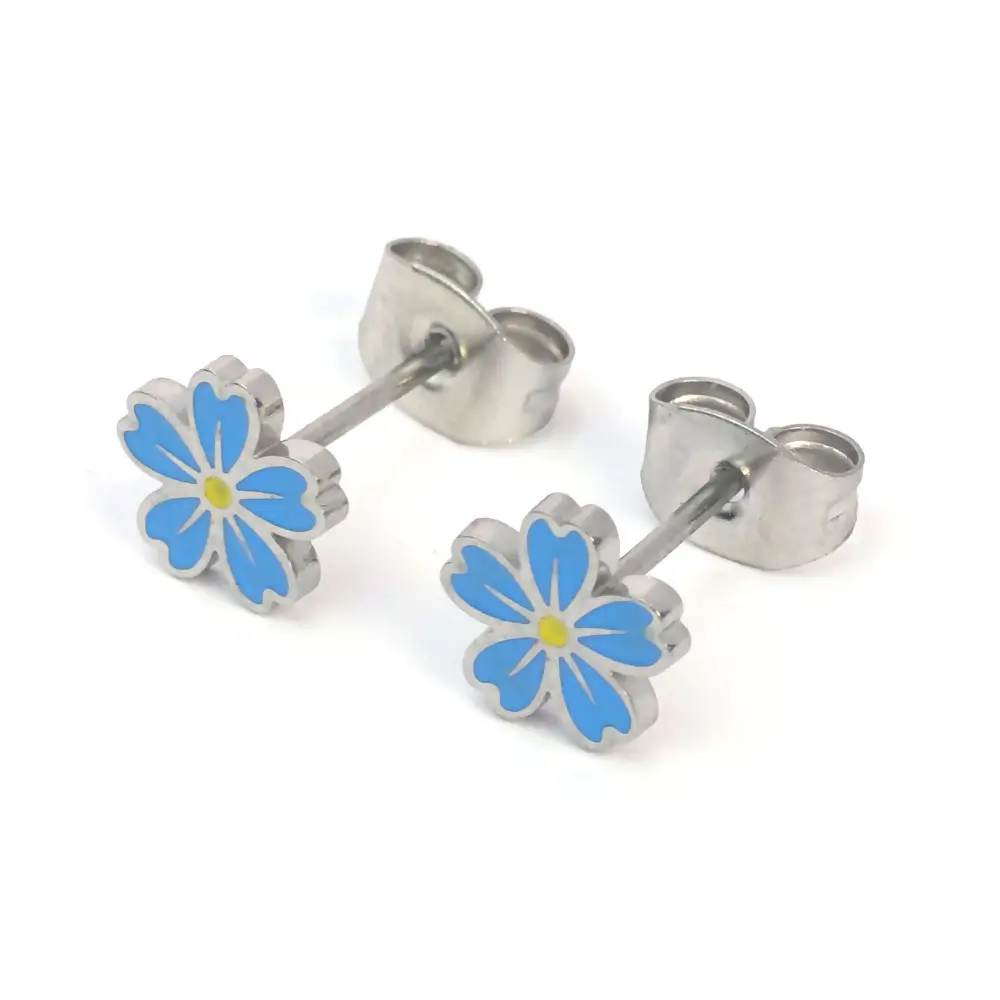 Pair of silver stud earrings shaped like six-petaled blue flowers with a small yellow center, shown at a slight angle with the earring posts and backs visible.