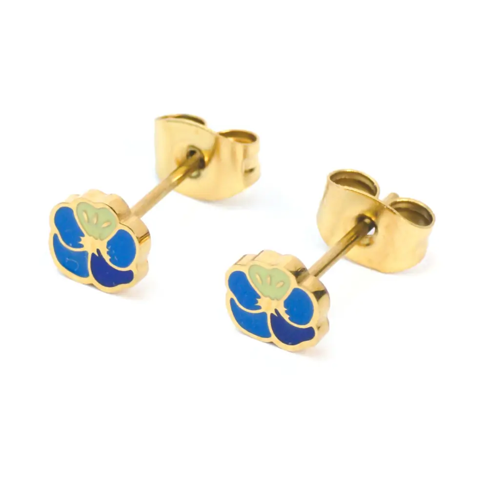 Gold-trimmed stud earrings shaped like a blue and yellow enamel flower, shown with the gold earring backs attached.