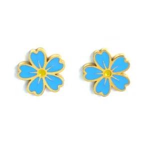Gold-trimmed stud earrings shaped like a blue and yellow forget-me-not flower.
