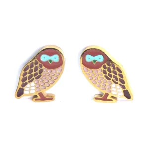 Gold owl earrings with light brown wings and blue eye detail.