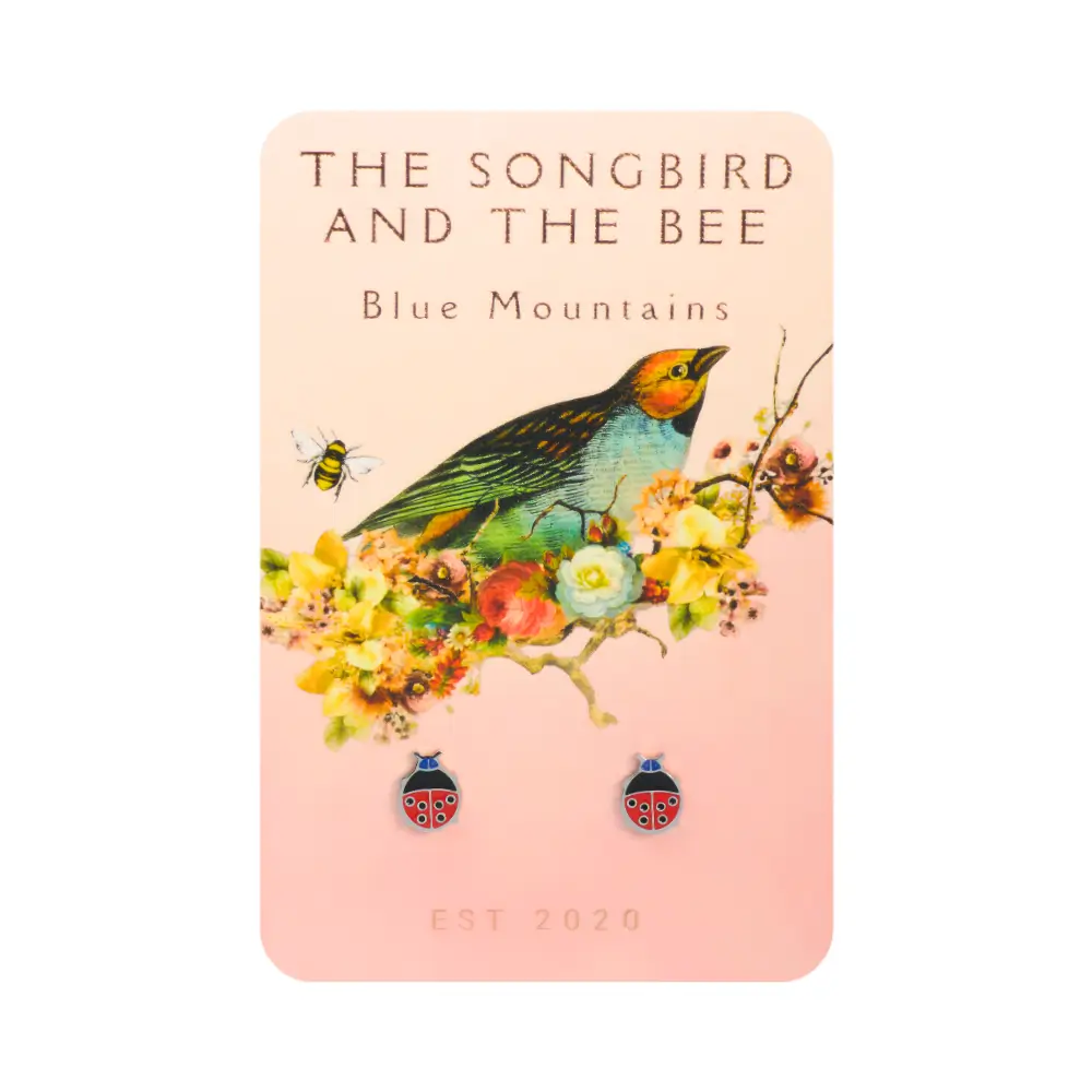 ladybug earrings on a card